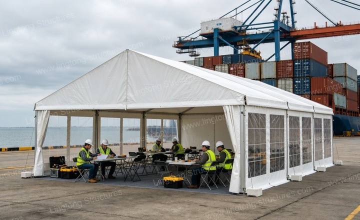 Workers rest tent in rainy humid climate with A-frame roof and roll-up sidewalls for ventilation