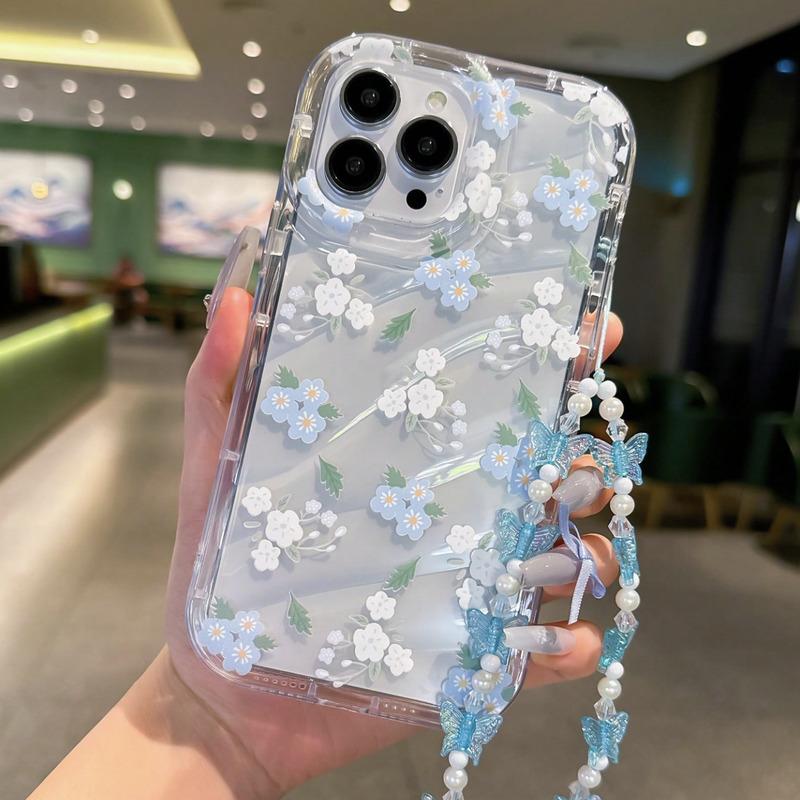 Foto de Funda transparente estampado floral. Incluye correa de mano.