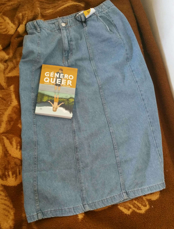 A jean skirt and a book.