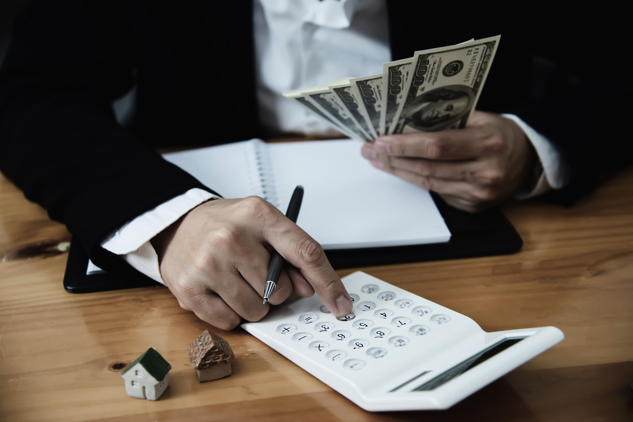 business man show money bank note make financial plan invite people sell buy house car monetary prop