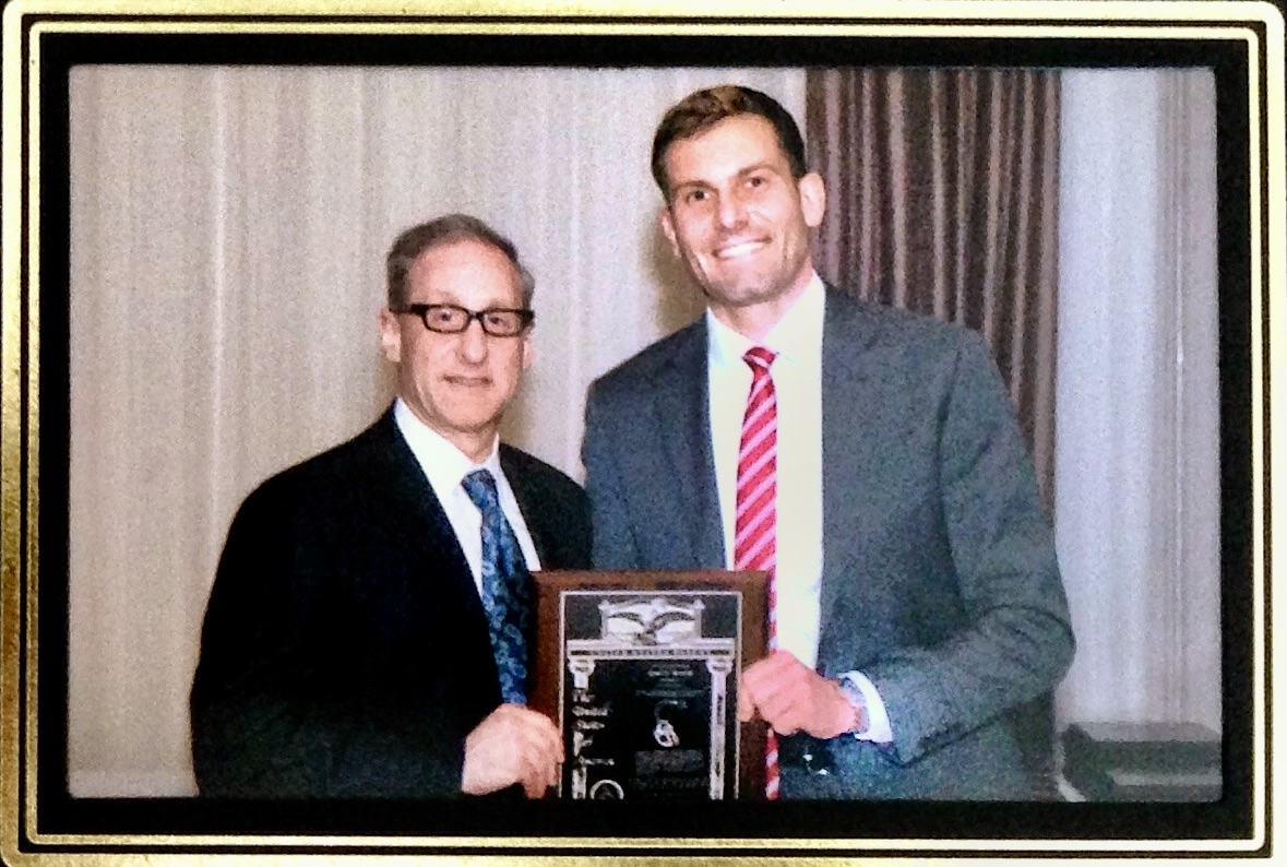 Enri Zhulati receiving patent award from VP of R&D at St. Jude Medical