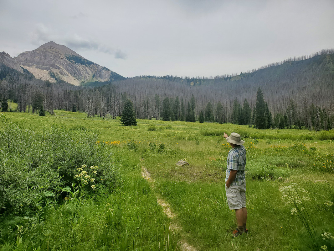 Pointing at a mountain