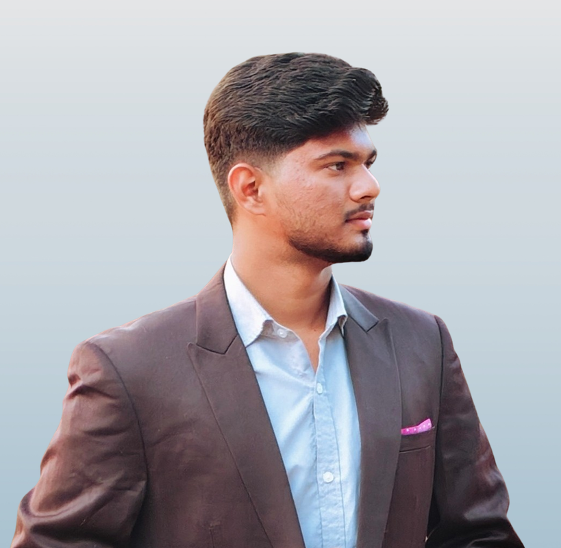 Professional portrait of Kanha Behera smiling confidently