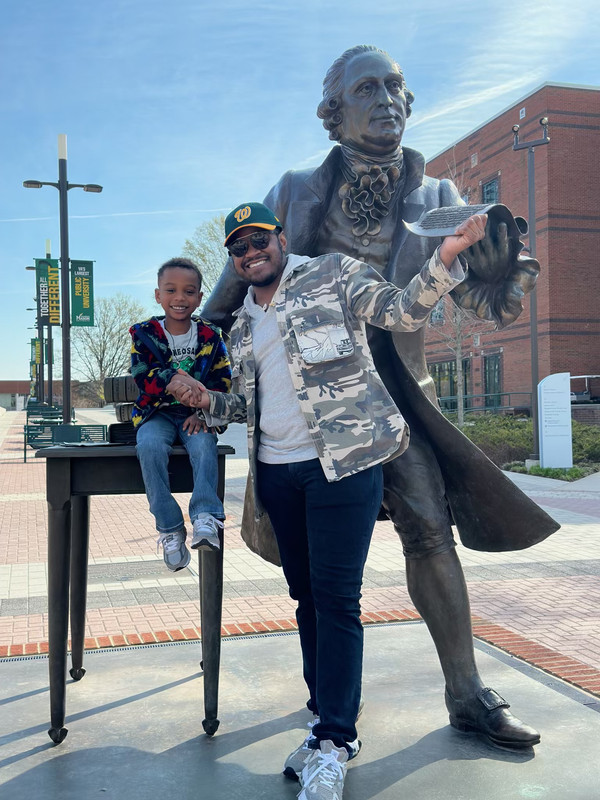 Deleon Barnett-Smalls and son at George Mason University