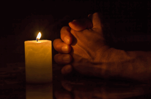 [Image: candle-prayer.png]