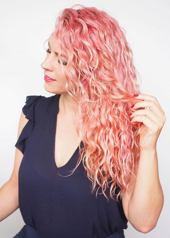Strawberry blonde curly long hair