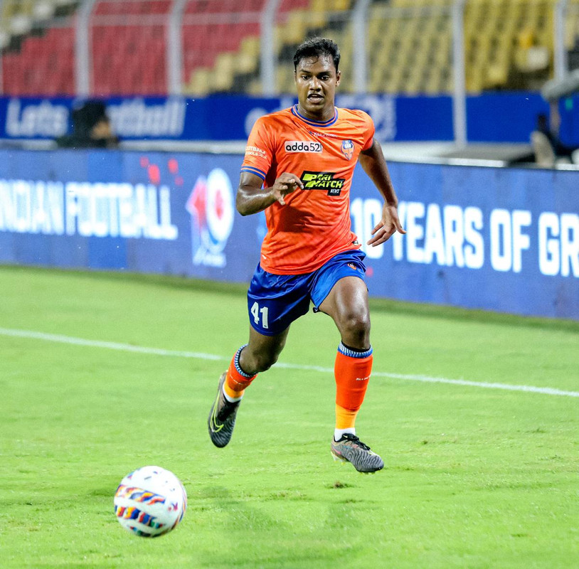 Close-up of a football player in action.