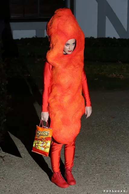 Katy-Perry-Giant-Cheetos-Costume-Halloween-2014.webp