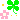 A pixel art gif of a flower and clover
