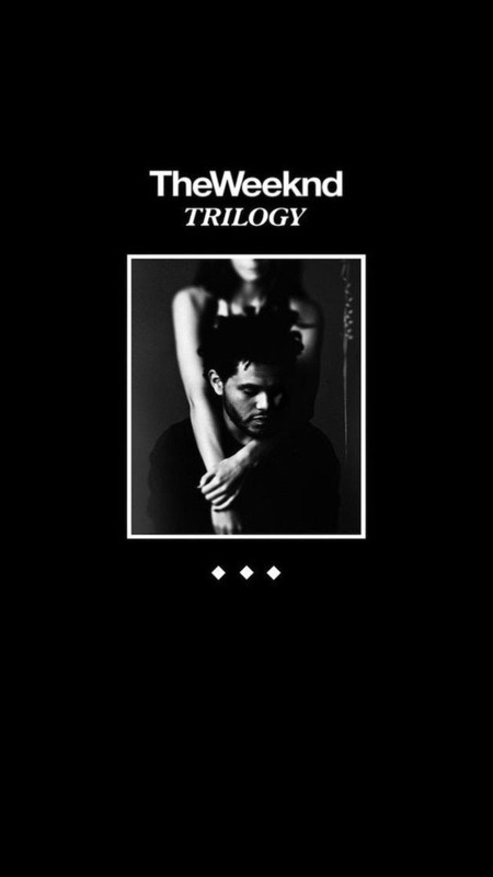 A moody, black and white photo of The Weeknd.
