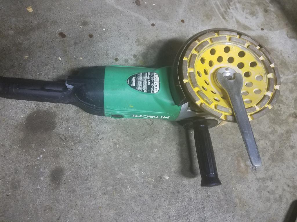 Angle grinder nut stuck with a cup 