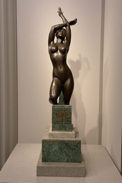 A-bronze-sculpture-depicting-a-11