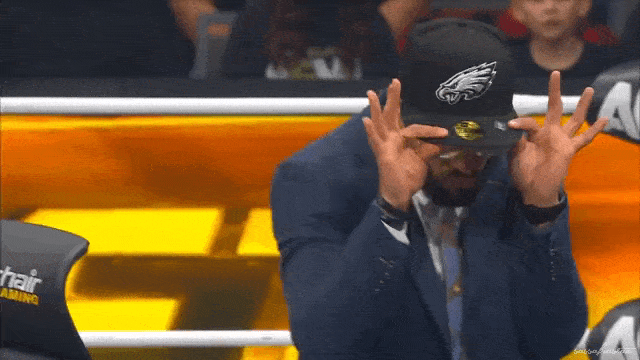 aew_20250305_ricochet_strickland_contractsigning1