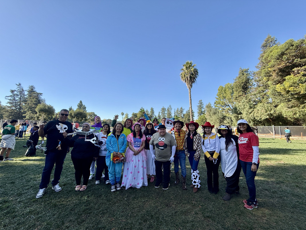 Students posing in coordinated “performative male” costumes, highlighting humor and creativity in this year’s Halloween celebrations.