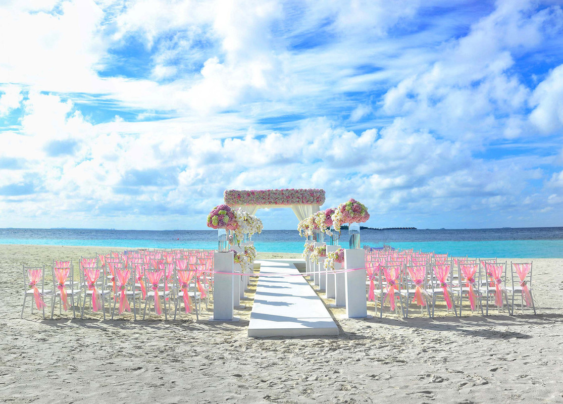 pinkandwhiteweddingbeach.jpg
