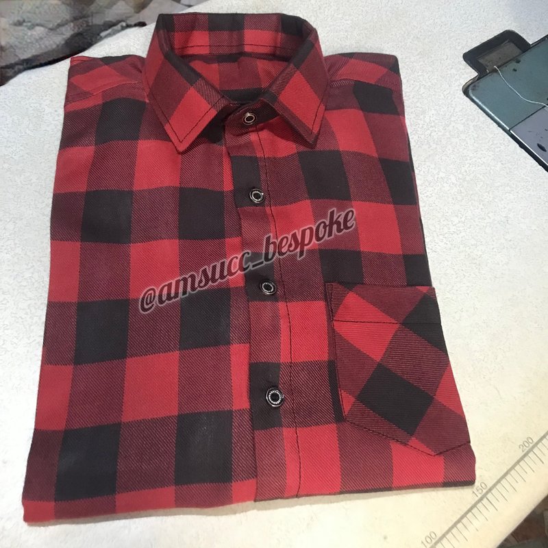 Custom tailored trousers by FAWLUX bespoke tailors in Lagos