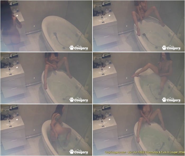 brunette-masturbating-with-dildo-in-the-bathtub-3.jpg