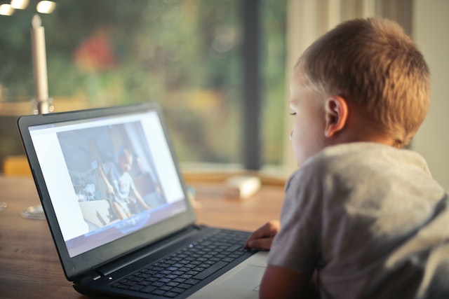 Image of child with laptop