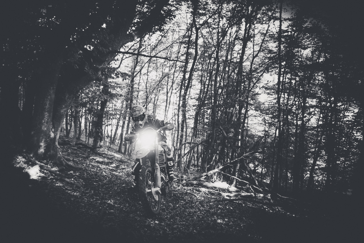 Enduro riding through the forest