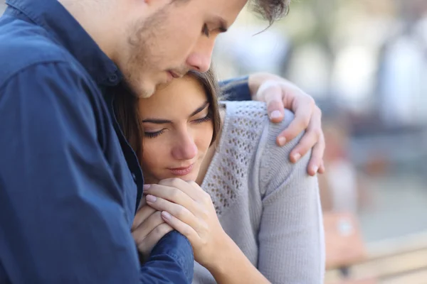 depositphotos-82359728-stock-photo-man-comforting-his-sad-mourning