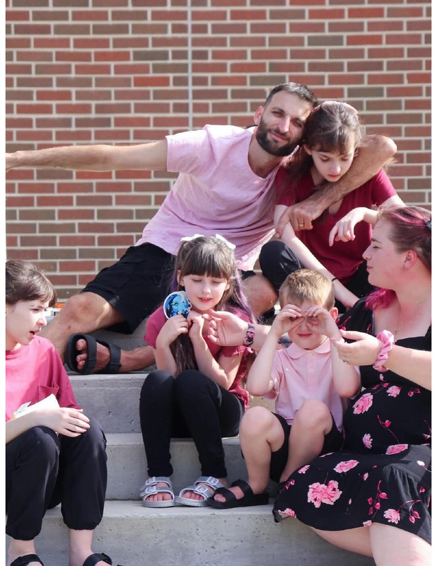 Rebecca Boutin and family on the steps