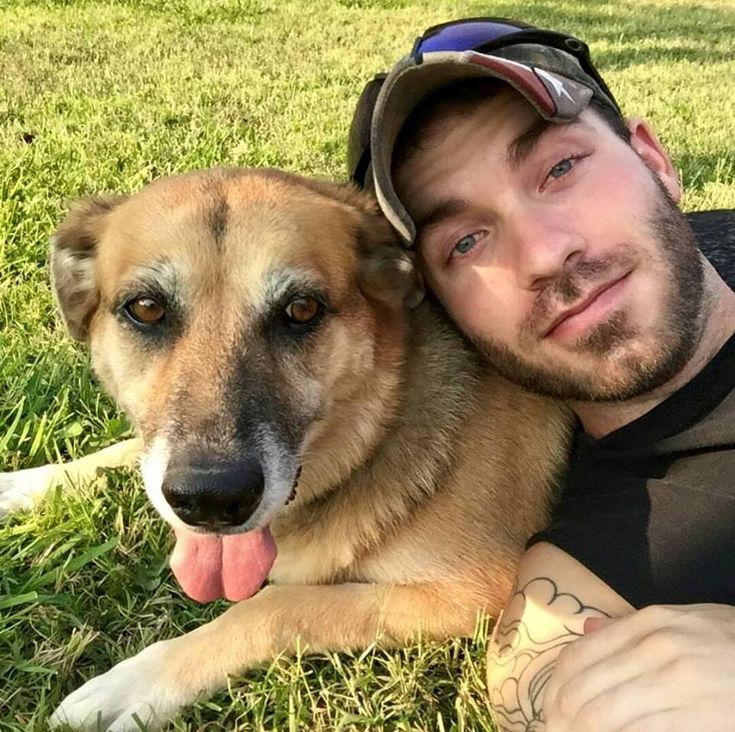 Pet owner with their pet during a grooming or at-home care moment