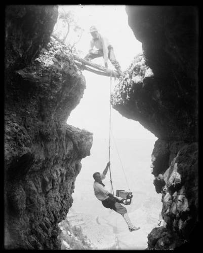 Emery-Kolb-Suspended-from-a-Rope-by-Ellsworth-Kolb-Grand-Canyon