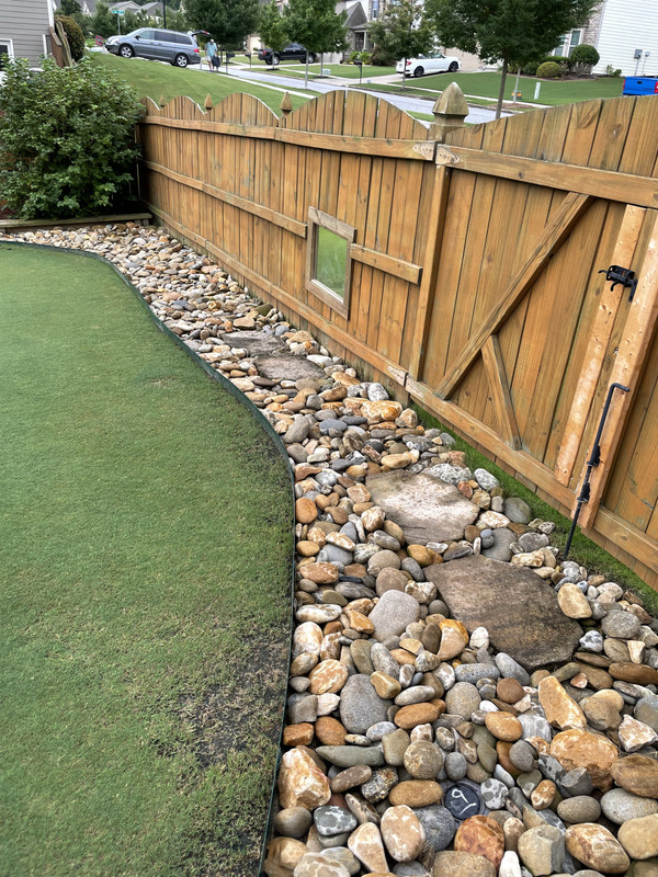 Rock border along fence line Lawn Care Forum