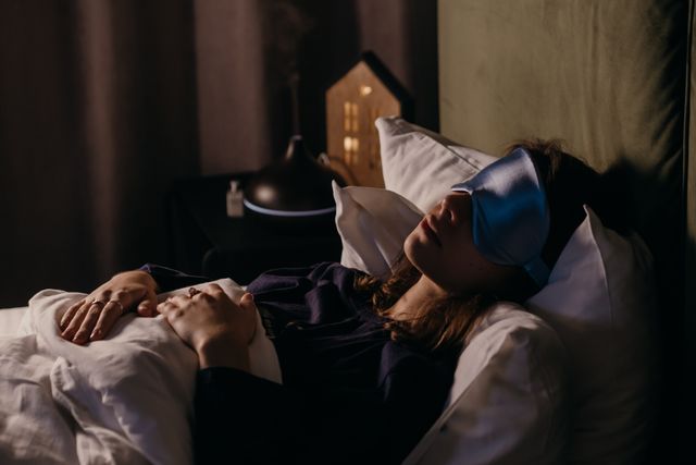 a woman getting enough sleep to give her skin and body time to recover 