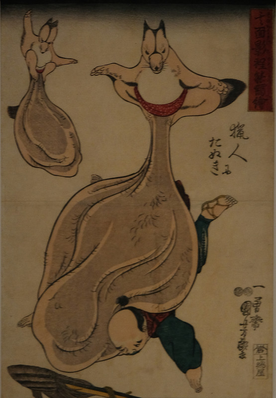 A statue of a Tanuki, or raccoon dog