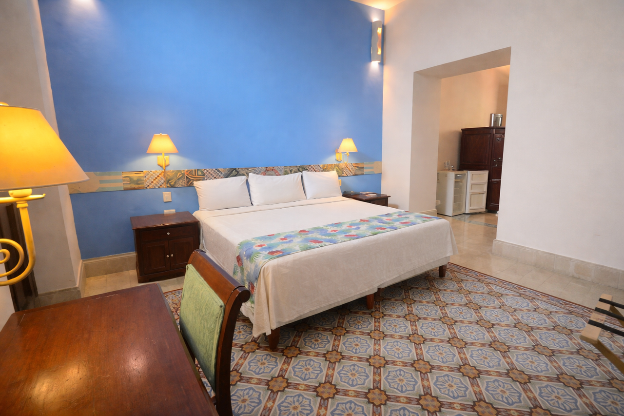 Executive room with pasta tile floors at Hotel Centro Historico Merida