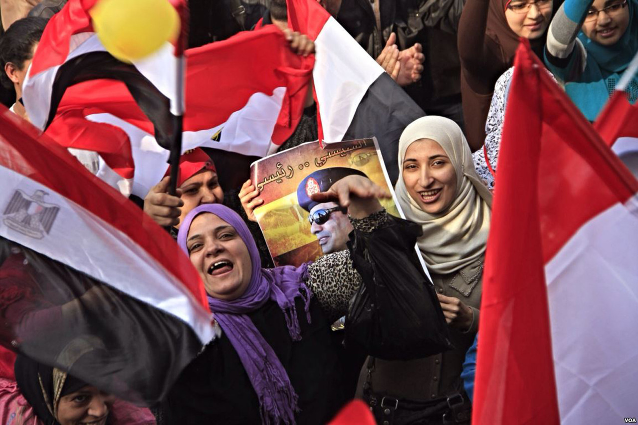 C:\Users\lenovo\Pictures\Saved Pictures\muslim woman\Participants_holding_flags_and_pictures_of_Abdel_Fateh_el_Sissi_big.jpg