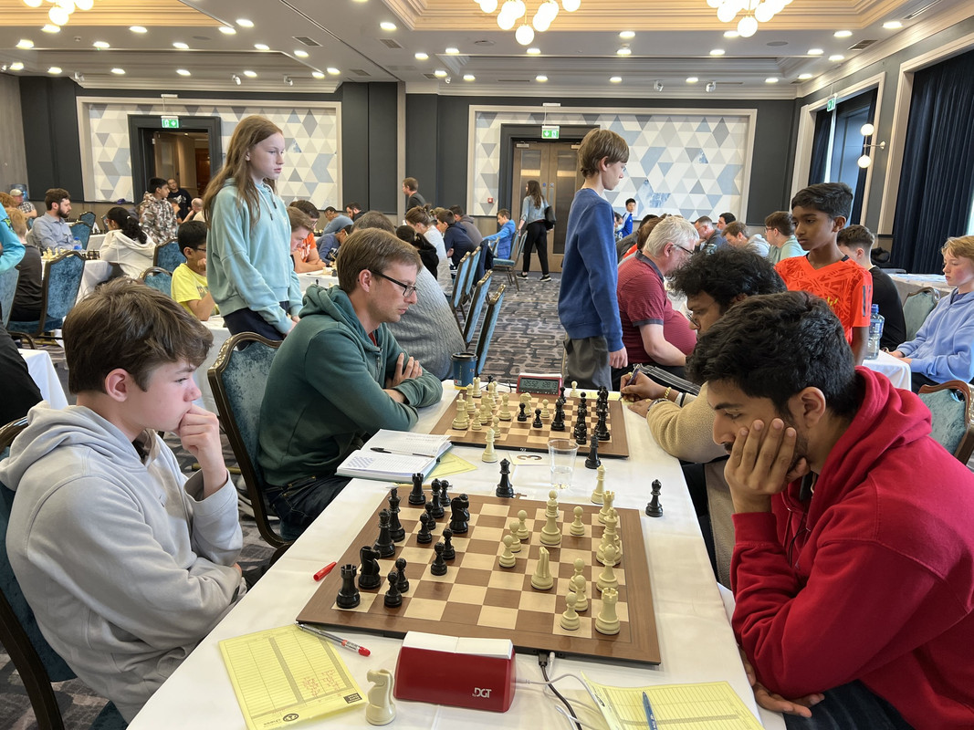 Photo of myself and others playing during the Irish Championship: First Weekender (Credit: Irish Chess Union)