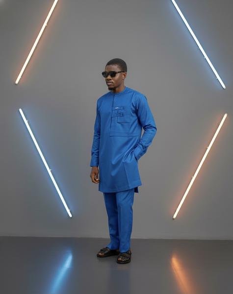 Bold blue bespoke kaftan tailored by FAWLUX bespoke tailoring in Lagos Nigeria