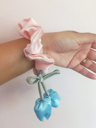 Tulip scrunchie styled on wrist