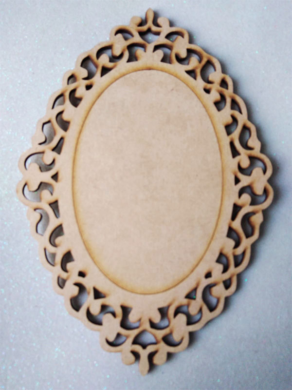 Laser Tabla ovalada arabescos de 16.5cm x12cm