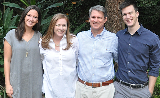 Lizzie Fletcher with her husband and his two grown children