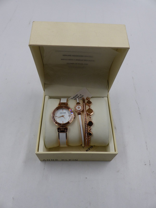 ANNE KLEIN WATCH AND BRACELETS FOUR PEICE SET ROSE GOLD 980273534