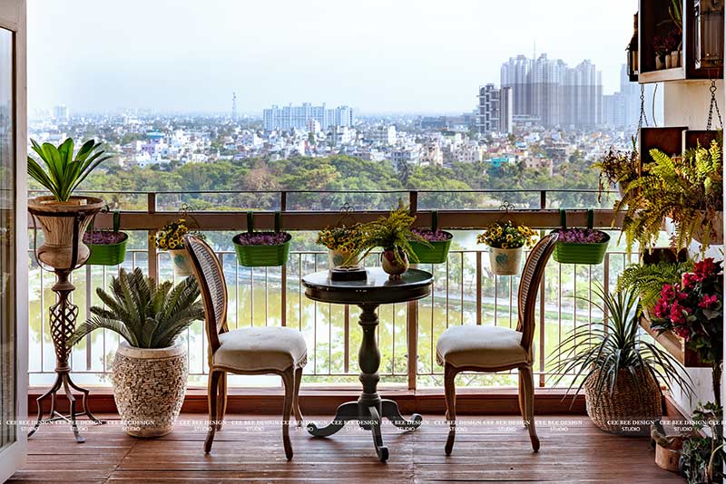 balcony with indoor plants and the city view