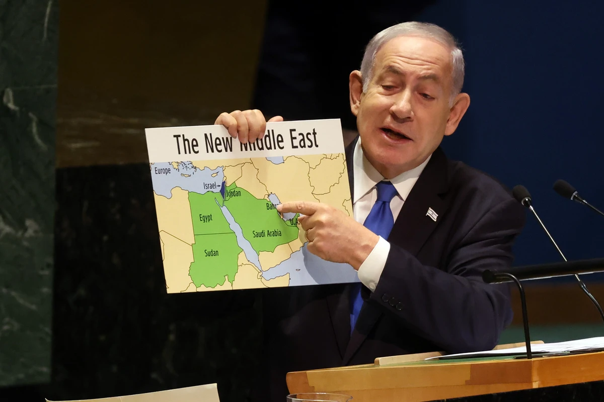 benjamin-netanyahu-holds-a-map-of-the-middle-east-without-palestine.webp