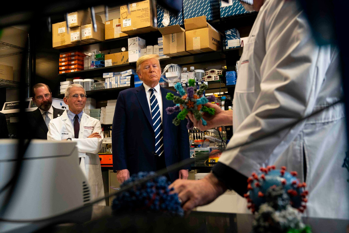 Anthony Fauci briefing President Donald Trump on the coronavirus at the National Institutes of Health’s vaccine research center in Bethesda, Maryland