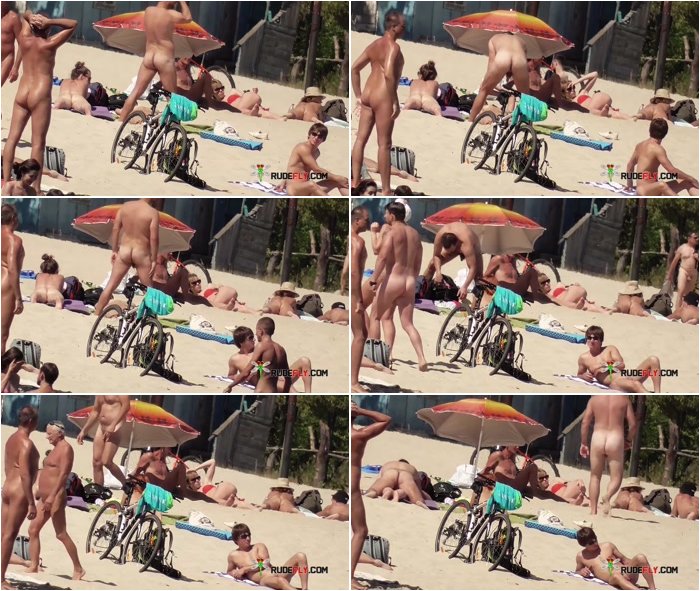 Hot-babe-sunbathes-on-nude-strand-3.jpg