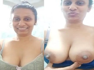 Sri Lankan aunty with enormous breasts posing for a selfie
