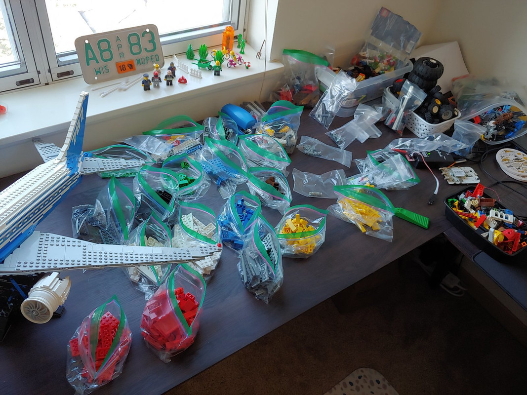 02. Desk is already being taken over by bags and bins.