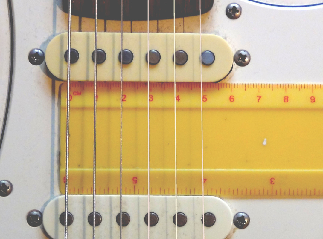 Pickup's pole pieces don't align with strings The Harley Benton Club