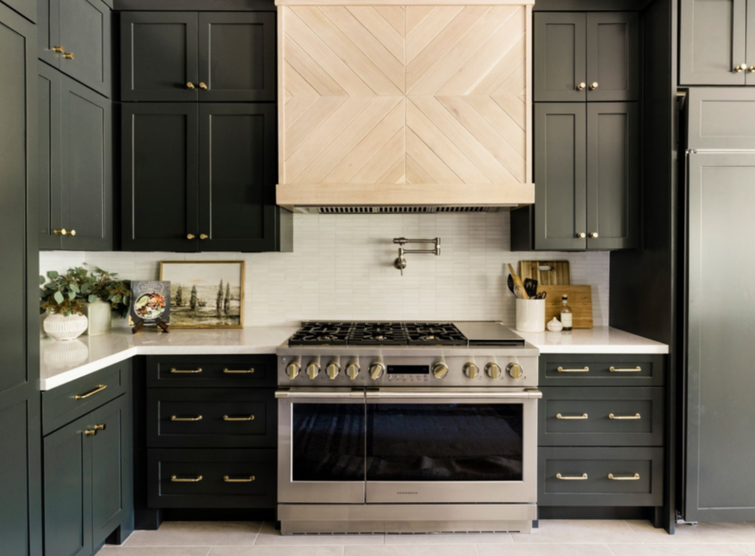Traditional kitchen with rich wood cabinetry and granite countertops