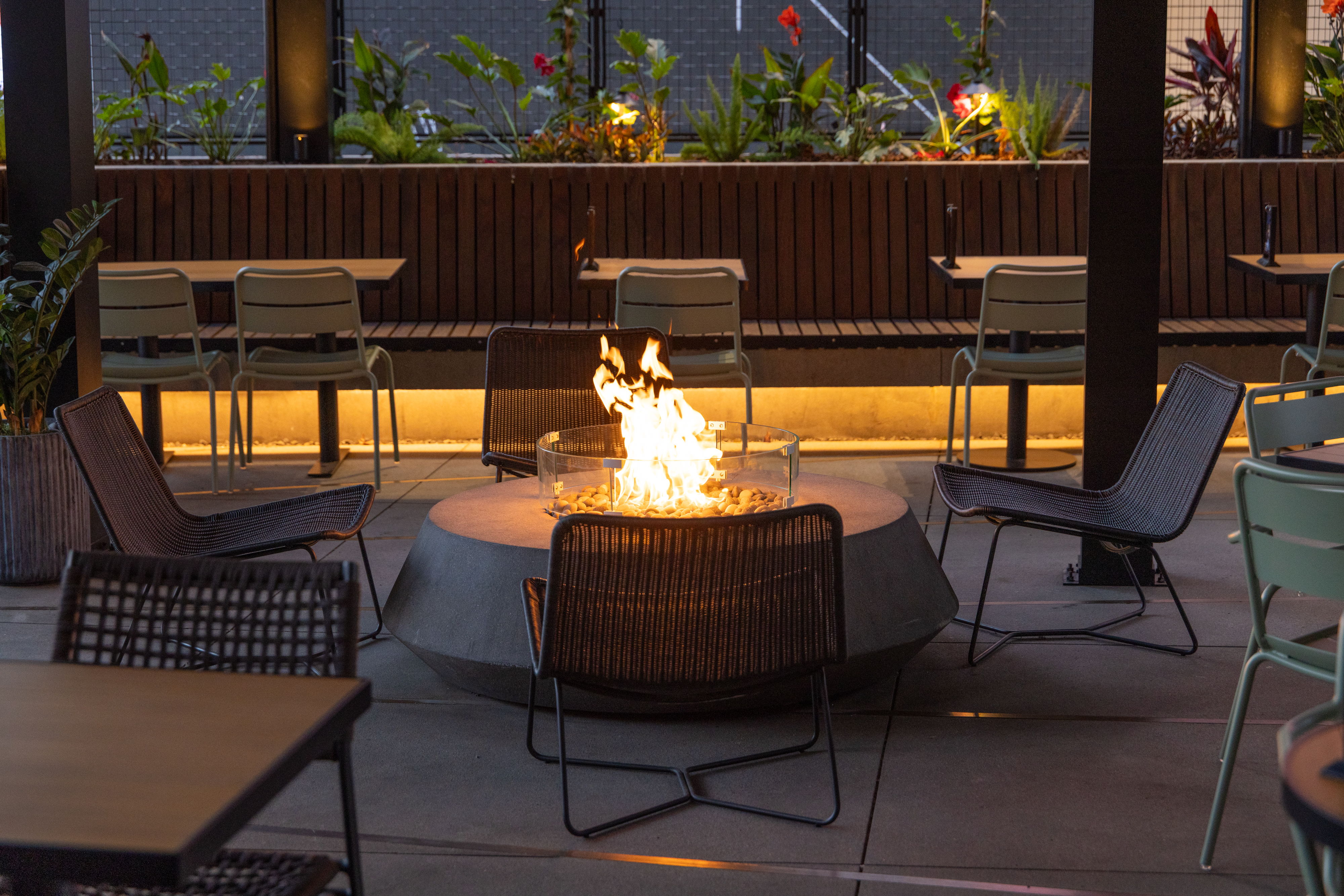 La Popular's inviting patio with fire features