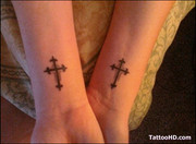 amazing-black-ink-cross-tattoos-on-wrists