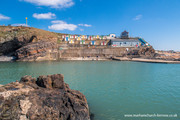 Bude sea pool with beach huts.