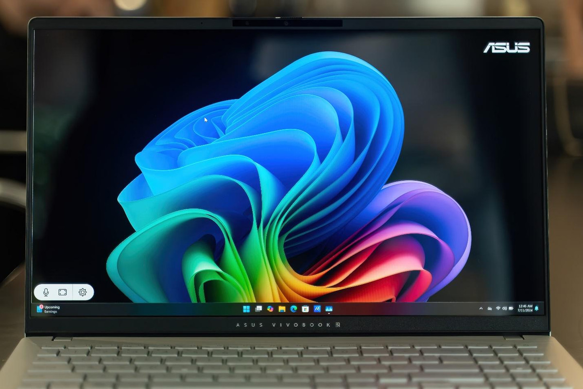 A computer with a colorful flower on the screenDescription automatically generated A computer with a colorful flower on the screenDescription automatically generated